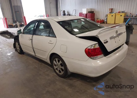 2006 Toyota Camry Xle z USA, uszkodzony, nr VIN 4T1BE30K26U665914
